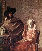 VERMEER VAN DELFT, Jan A Lady Drinking and a Gentleman (detail) ar oil on canvas